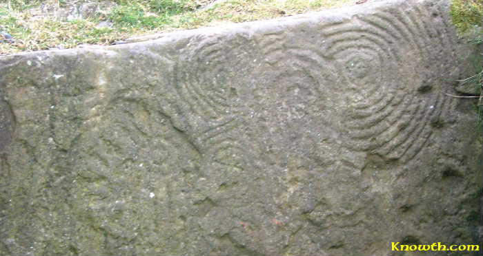 Cairn U - Carving on backstone of left hand chamber