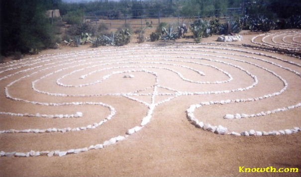 7 circuit classic female labyrinth built of rose quartz with 55 runic energy symbols.